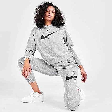 Nike Women's Sportswear Swoosh Fleece Jogger Pants in Grey/Dark Grey Heather Size Medium, Cotton/Fleece