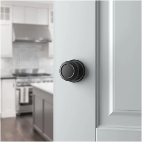Traditional Passage Door Knob with Traditional Round Rose Baldwin Finish: Venetian Bronze