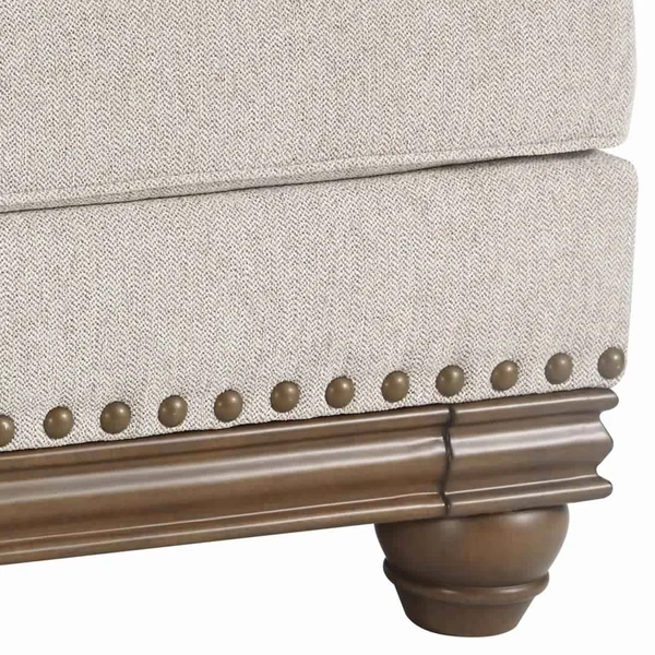 Benjara BM206321 Nailhead Trim Fabric Upholstered Ottoman with Turned Legs Light Gray