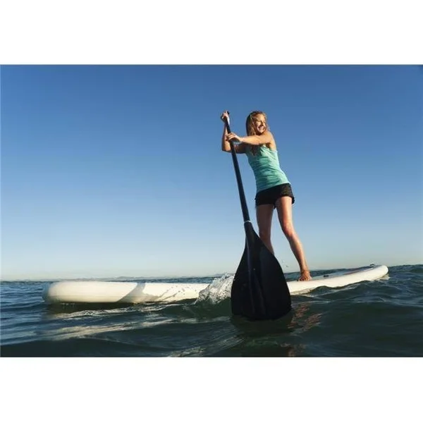 A Woman Paddling While Standing on A Surf Board Off Dos Mares Beach - Tarifa Cadiz Andalusia Spain Poster Print 36 x 24 - Large